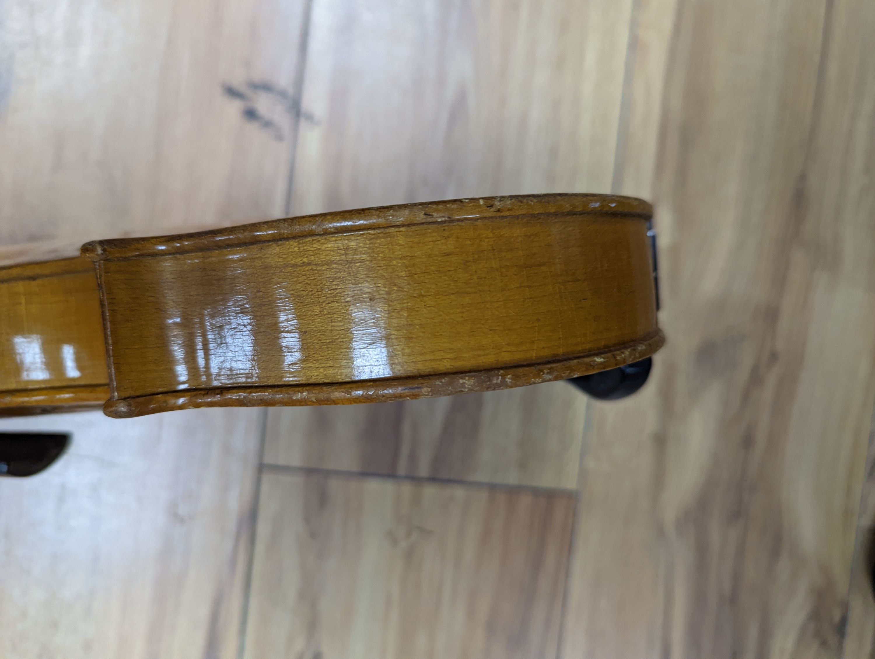 A violin and bow, various records etc
